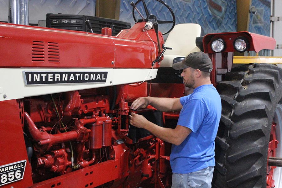 Man working on a tractor