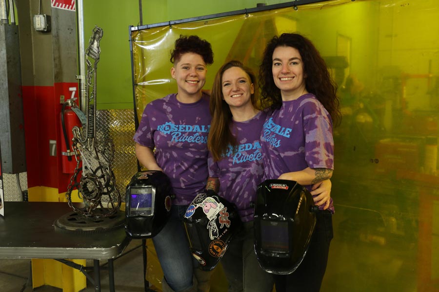 Three women welding