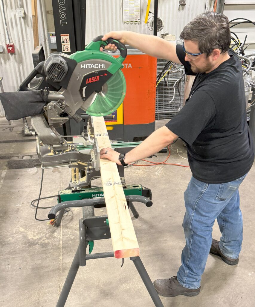 Man training on a table saw at Rosedale's new Carpentry Program