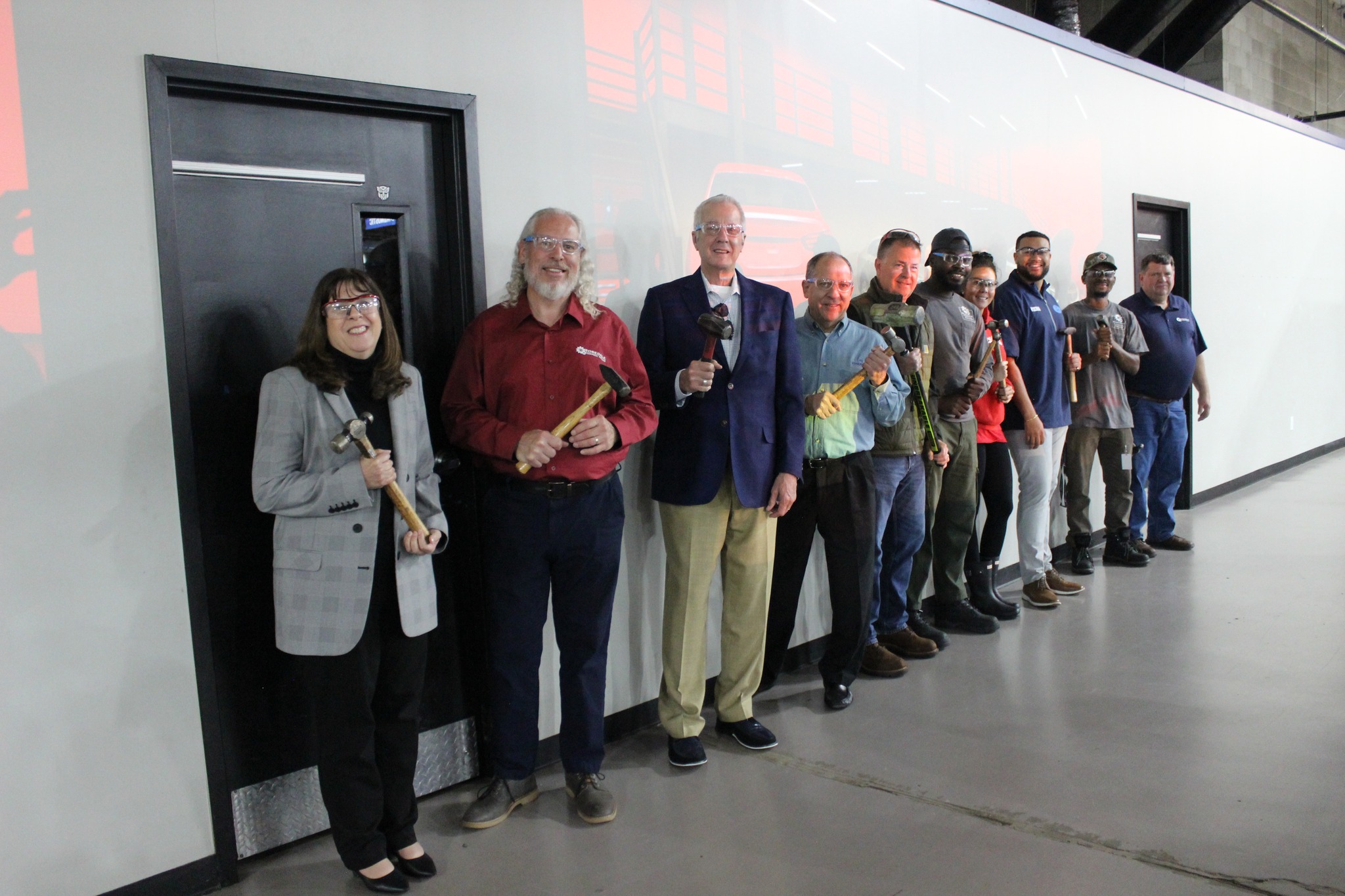 Individuals pose for a photo during the Phase 3 groundbreaking at Rosedale Technical College
